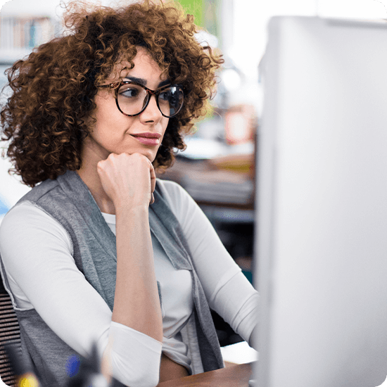 A person looking at their laptop