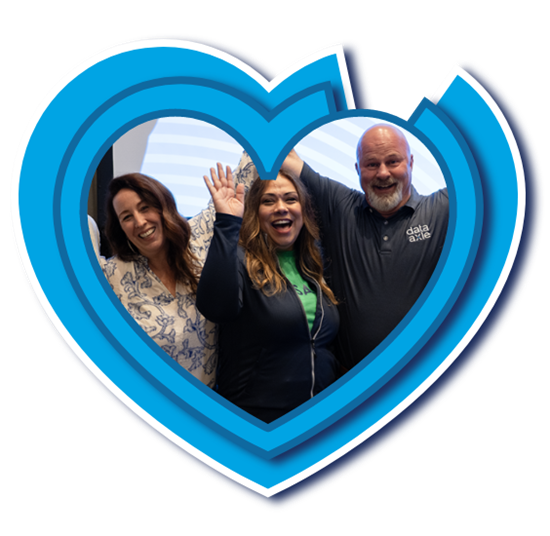 People standing inside of a blue heart