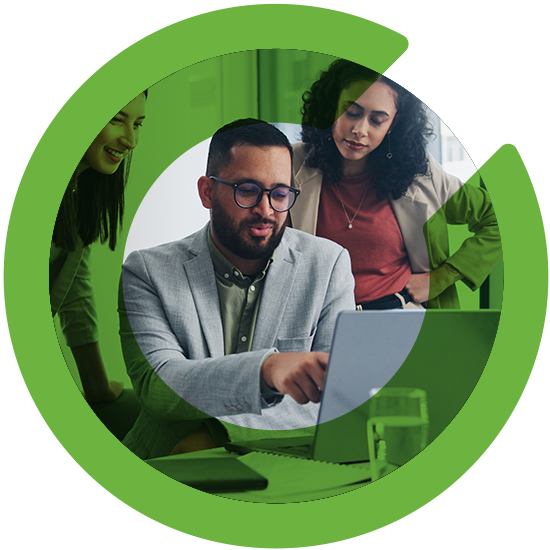 Several people looking over a laptop, with a green C overlay