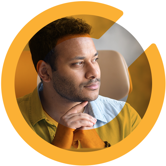 A profile of a man with an orange C overlay