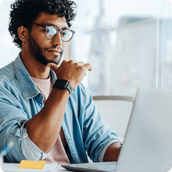 Man working in front of laptop