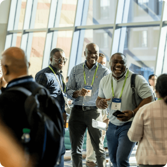 A group of people socializing at a conference