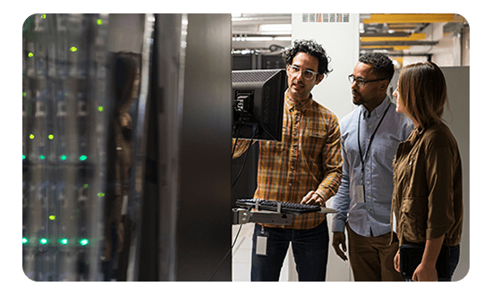 Employees in a server room