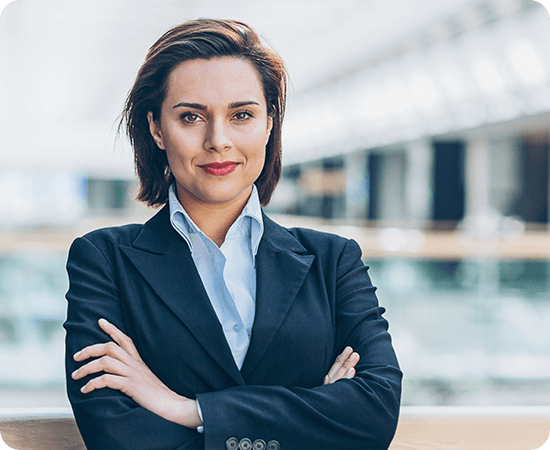A woman standing with her arms crossed