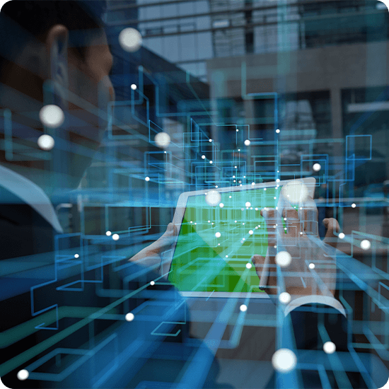 Person looking at a digital tablet in a computer room