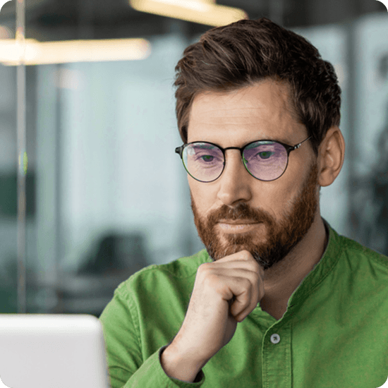 Man looking at a computer