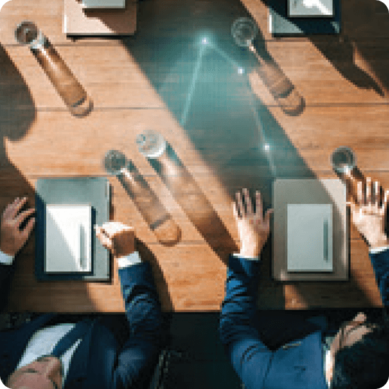 Effective Governance and Board Oversight in a Globalized Information Environment - people sitting at conference table