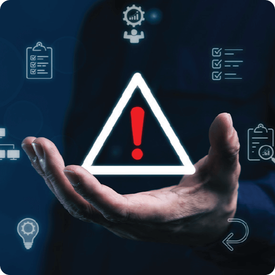 Person holding an important sign - triangle with exclamation point