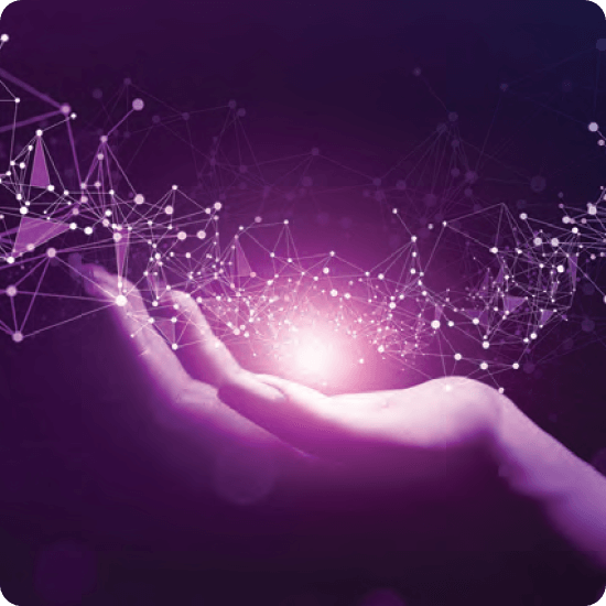 A hand grips a bright purple light, casting a warm glow in the dark.