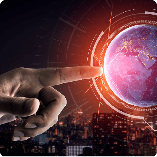 A finger pointing to a globe