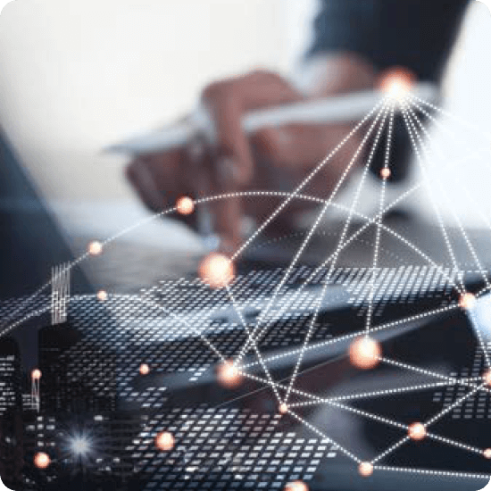 A hand typing on a laptop, with network connection lines and icons displayed around 