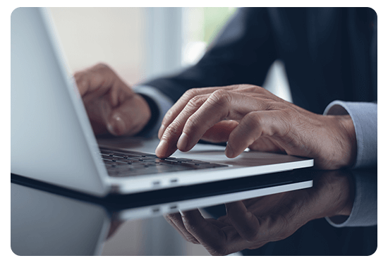 Person typing on a laptop