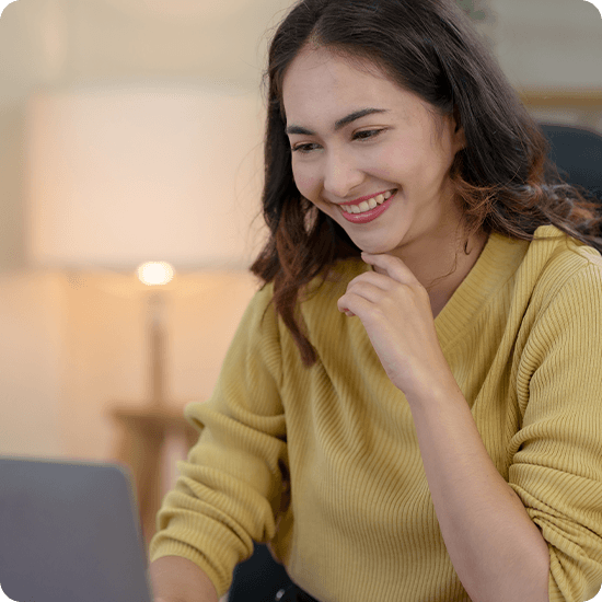 Student looking at a laptop