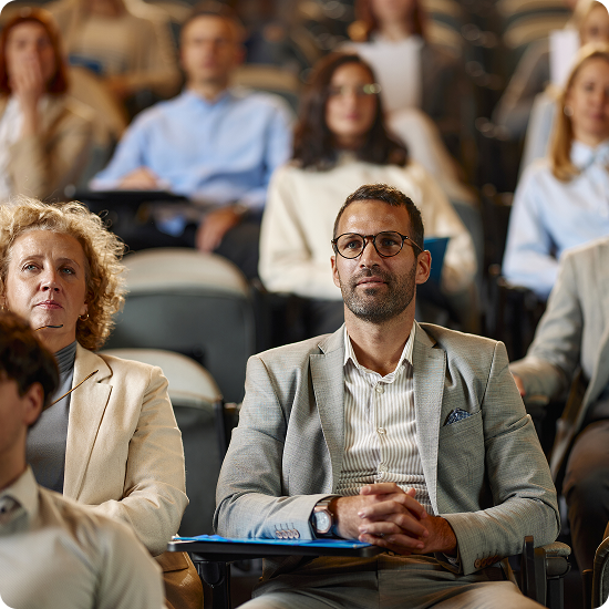 Group of people listening to a lecture