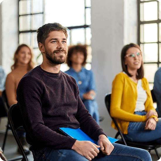 Higher education students sitting in a classroom